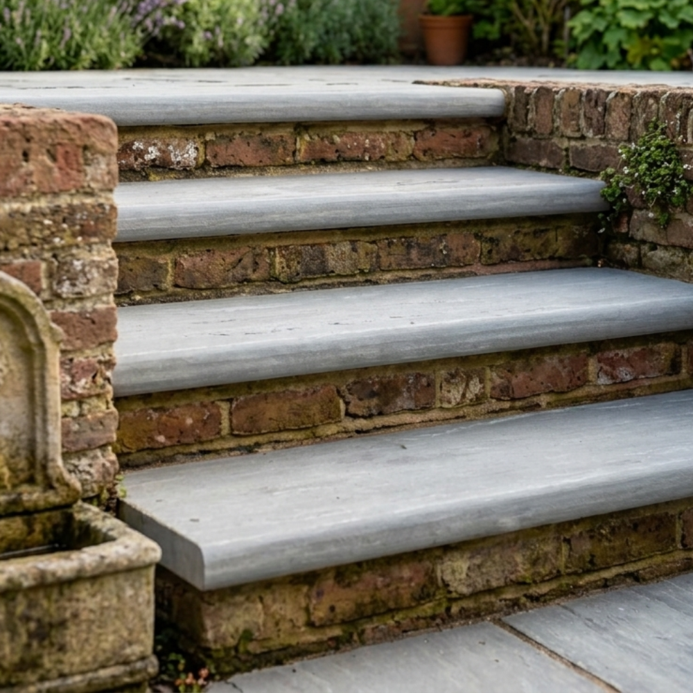 Kandla Grey Riven Sandstone 900x450x35 Sawn Edged Bullnose Steps