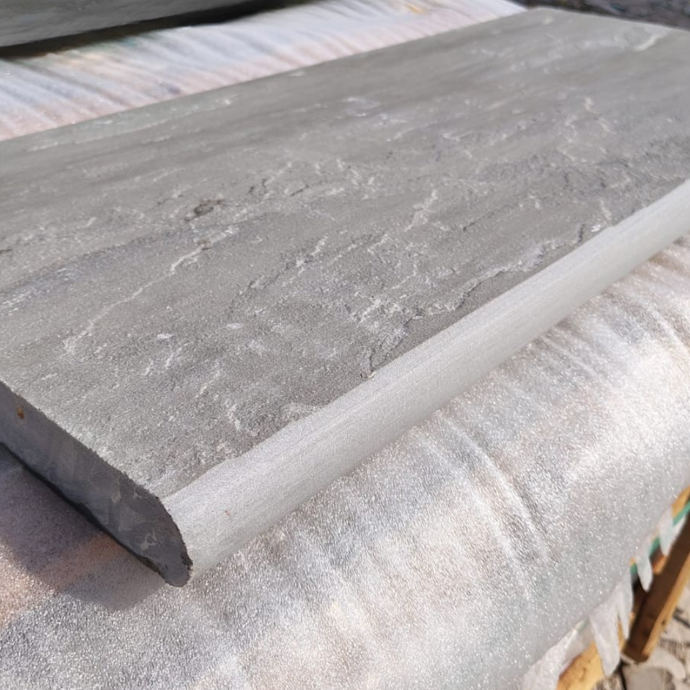Kandla Grey Riven Sandstone 900x450x35 Sawn Edged Bullnose Steps